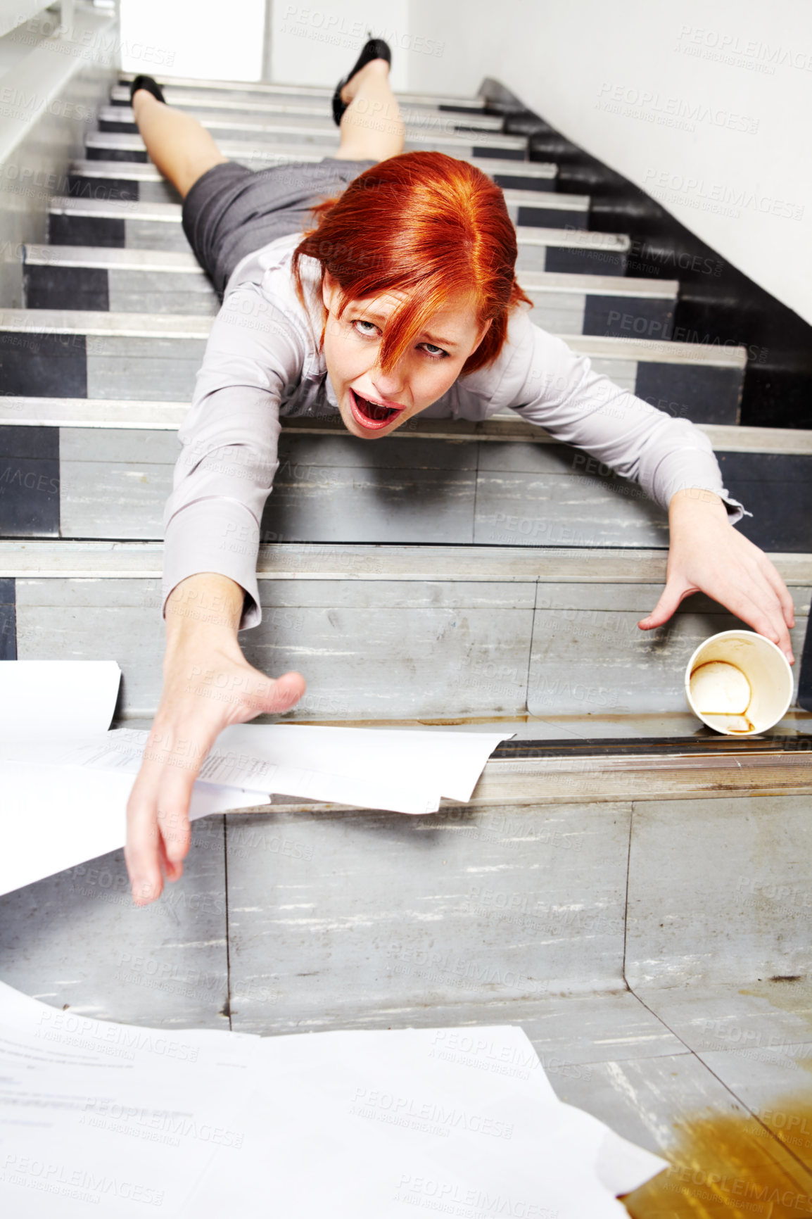 Buy stock photo Woman, falling down and stairs for injury, accident and wow with coffee, documents or paperwork in building. Business, person or employee slipping on steps at work or office with paper, cup and shock