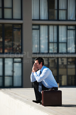 Buy stock photo Businessman, suicide and roof with stress, depression and mental health with suitcase outdoor in city. Professional, person or employee and rooftop of building with anxiety, risk, crisis and unhappy