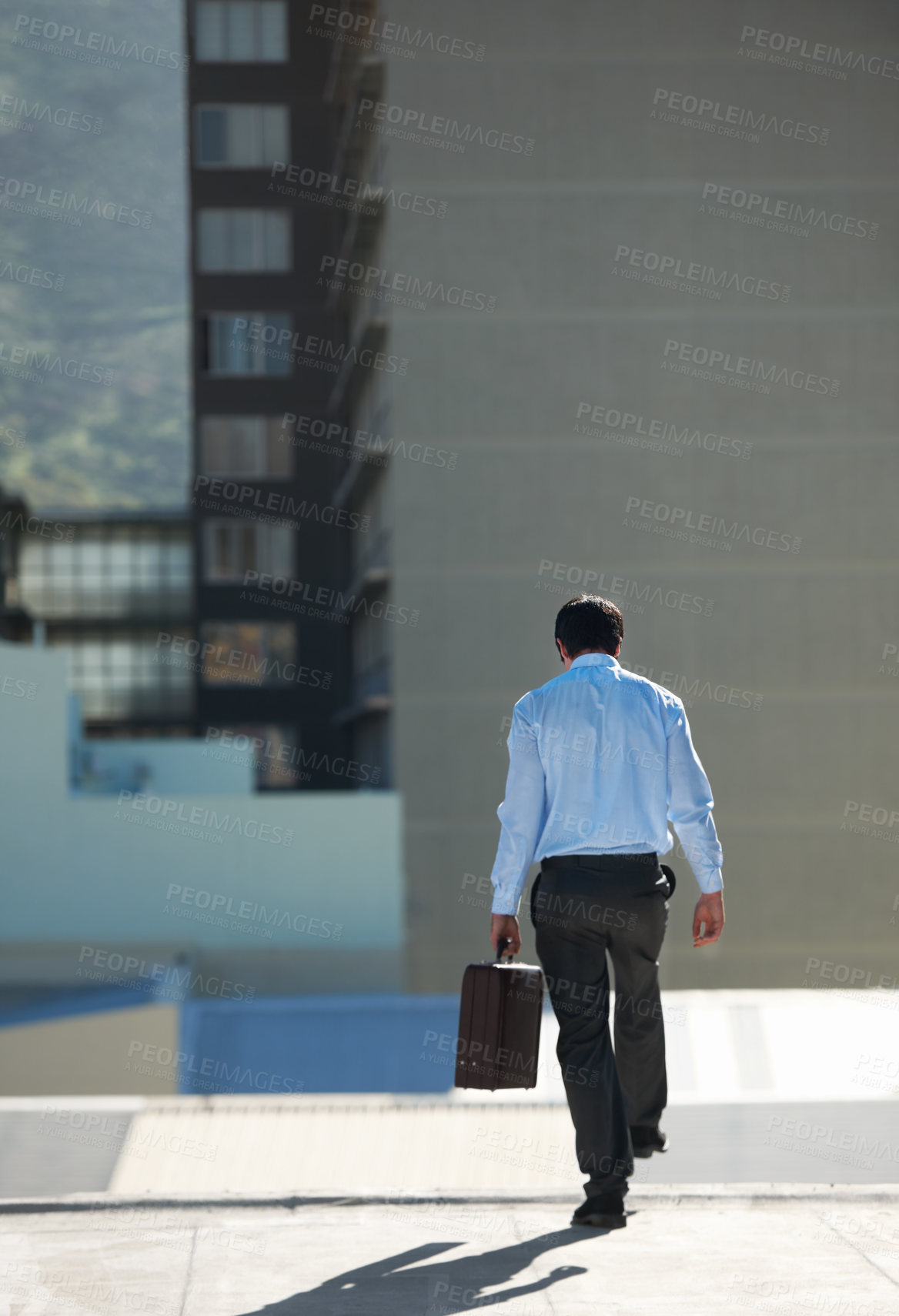 Buy stock photo Businessman, suicide and edge with stress, depression or problem on rooftop of building with suitcase for risk. Professional, person or employee with briefcase, mental health and anxiety in city
