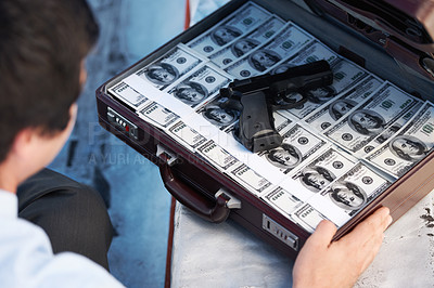 Buy stock photo Businessman, gun and briefcase with money for crime, corruption, thief and fraud outdoor for financial crisis. Professional, man and weapon with cash, finance and secret for laundering, scam or loan