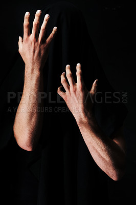 Buy stock photo Two arms isolated against a black background