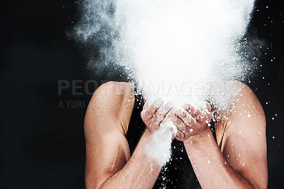Buy stock photo Man, throw and powder in face in studio on black background for mock up in fitness for gymnastics. Male athlete, chalk or dust for grip, hands and sports competition for strength, power or dedication