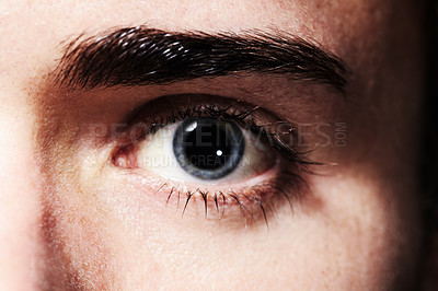 Buy stock photo Macro, portrait and eye of man, vision and healthy eyesight, contact lens or retina for optometry. Face, closeup and iris of serious human, eyelash or eyebrow for ophthalmology, blue eyeball or skin
