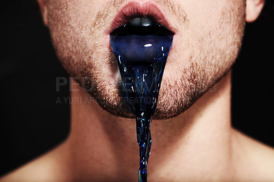 Buy stock photo Closeup of a young man's mouth spitting out purple liquid