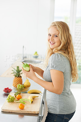 Buy stock photo Fruit, peeling apple or portrait of woman with a morning snack, breakfast meal or diet in kitchen at home. Healthy lunch, plus size or happy girl eating food to lose weight for wellness or gut health