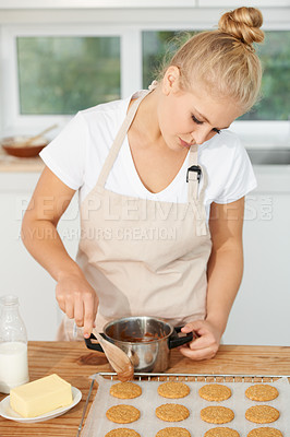 Buy stock photo Woman, kitchen or chef baking cookies with dough or pastry pot in a bakery shop with a dessert recipe. Food business, start or girl baker working in preparation of a sweet meal, cake or biscuits 