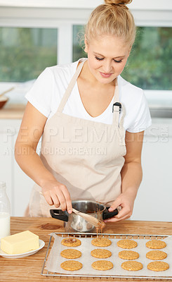 Buy stock photo Woman, kitchen or baker baking cookies with dough or pastry pot in a bakery shop with a dessert recipe. Food business, start or girl chef cooking in preparation of a sweet meal, cake or biscuits 