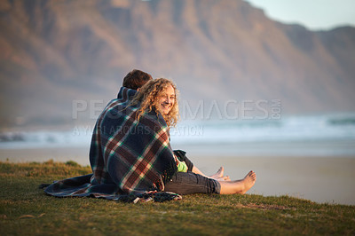 Buy stock photo Couple, outdoor and blanket on grass, smile and sitting with cold together, enjoying and love. Adventure, man and woman for quality time, happiness and relationship with romance, bonding or nature