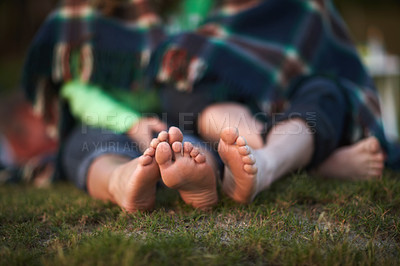 Buy stock photo Love, camping and the feet of a couple on the grass closeup for travel, freedom or adventure in nature. Hiking, relax or romance with a man and woman outdoor in the forest together for discovery