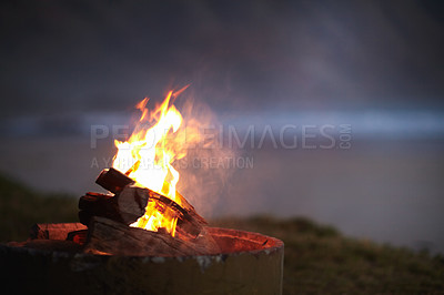 Buy stock photo Cropped view of a fire burning outdoors
