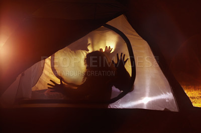 Buy stock photo Horror, shadow and hands on tent at night with silhouette from campfire in the dark. Camping, murder and scary profile of people outdoor in light from fire on nightmare in woods, forest or vacation