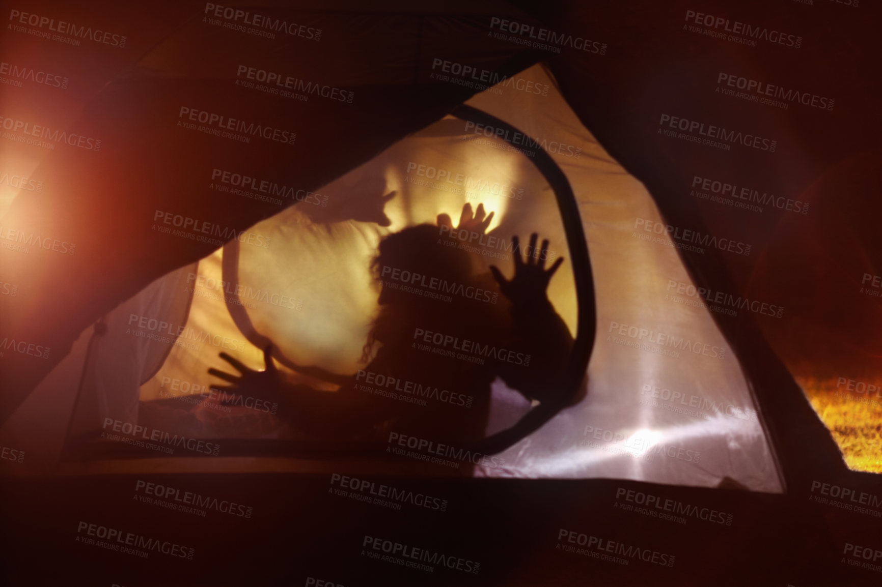 Buy stock photo Horror, shadow and hands on tent at night with silhouette from campfire in the dark. Camping, murder and scary profile of people outdoor in light from fire on nightmare in woods, forest or vacation