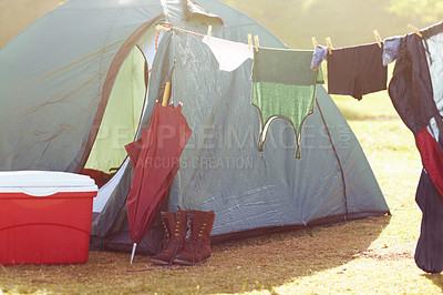 Buy stock photo Outdoor, clothing line and laundry for washing, tent and clean, camping and clothes. Campsite, sunrise and nature for travelling, adventure and holiday for vacation, campers and outside environment