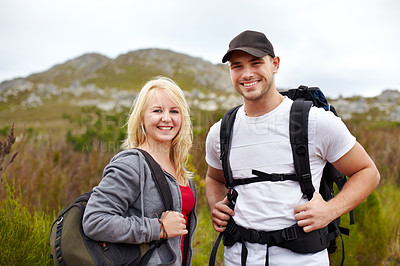Buy stock photo Backpack, portrait of woman and man with smile on hiking adventure in mountain with nature walk, freedom or wellness. Travel, trekking and happy couple of friends on natural outdoor journey together.