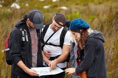 Buy stock photo Planning, hiking and friends with a map, travel and direction with health, journey and lost. People, men and women with nature, paper and confused with location, adventure and hike with trekking