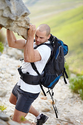 Buy stock photo Man with backpack, rock climbing and hiking adventure in mountain with nature, freedom and power. Travel, trekking and hanging, strong person in countryside on natural outdoor journey with fitness.
