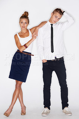 Buy stock photo Fashion, couple and clothes with style and people in portrait, trendy and stylish isolated on white background. Young, man and woman model in a studio with smart, casual clothing and pose together