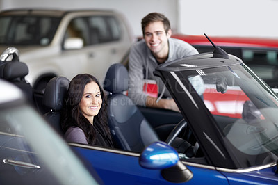 Buy stock photo Dealership, smile and woman buying a car with sales man for a test drive for choosing transport. Happy, purchase and portrait of female person in a new vehicle with employee at a shop or store.