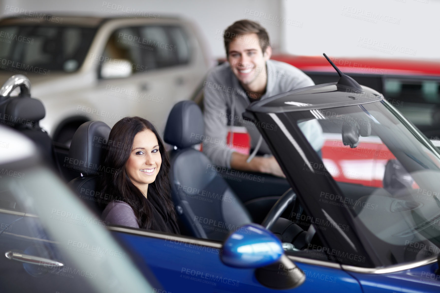 Buy stock photo Dealership, smile and woman buying a car with sales man for a test drive for choosing transport. Happy, purchase and portrait of female person in a new vehicle with employee at a shop or store.