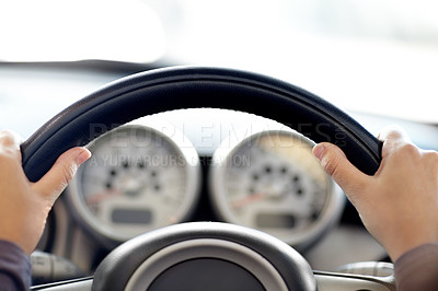 Buy stock photo Cropped view of a young woman's hands on the wheel of a new car