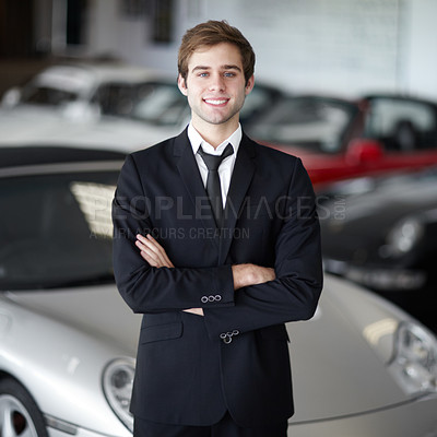 Buy stock photo Car, salesman in portrait at showroom and arms crossed with smile, transport and sales job. Worker at dealership, vehicle for driving and professional man with career and selling luxury automobile
