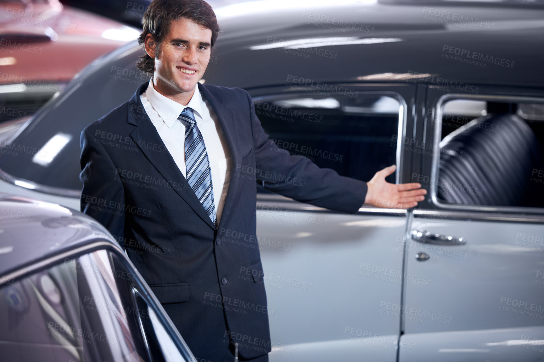 Buy stock photo Cars, smile and portrait of salesman at dealership with confidence, business and sales job. Professional, vehicle for driving and employee in showroom for career, happiness or selling transportation