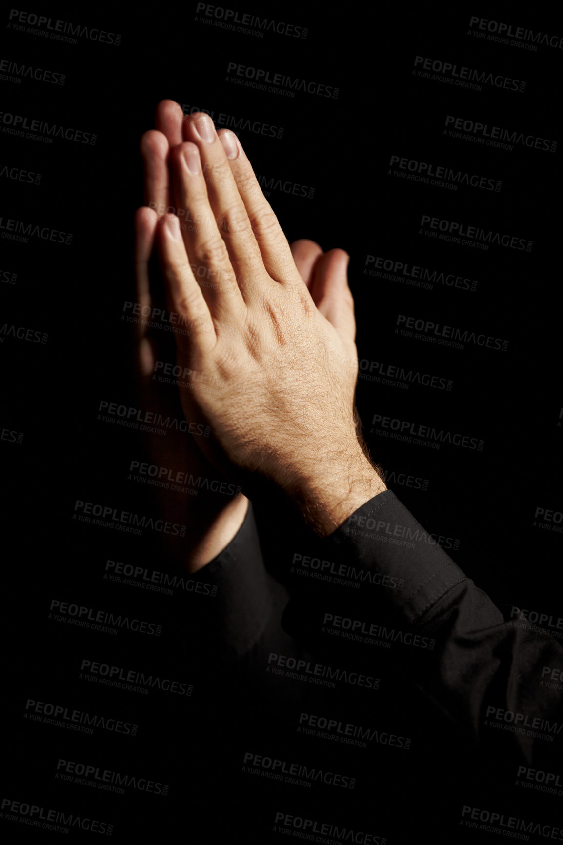 Buy stock photo Prayer, hands and black background for hope, religion and faith or ask for help with worship or spiritual support in studio. Praying emoji, christian person and God, forgive or humanity in dark room