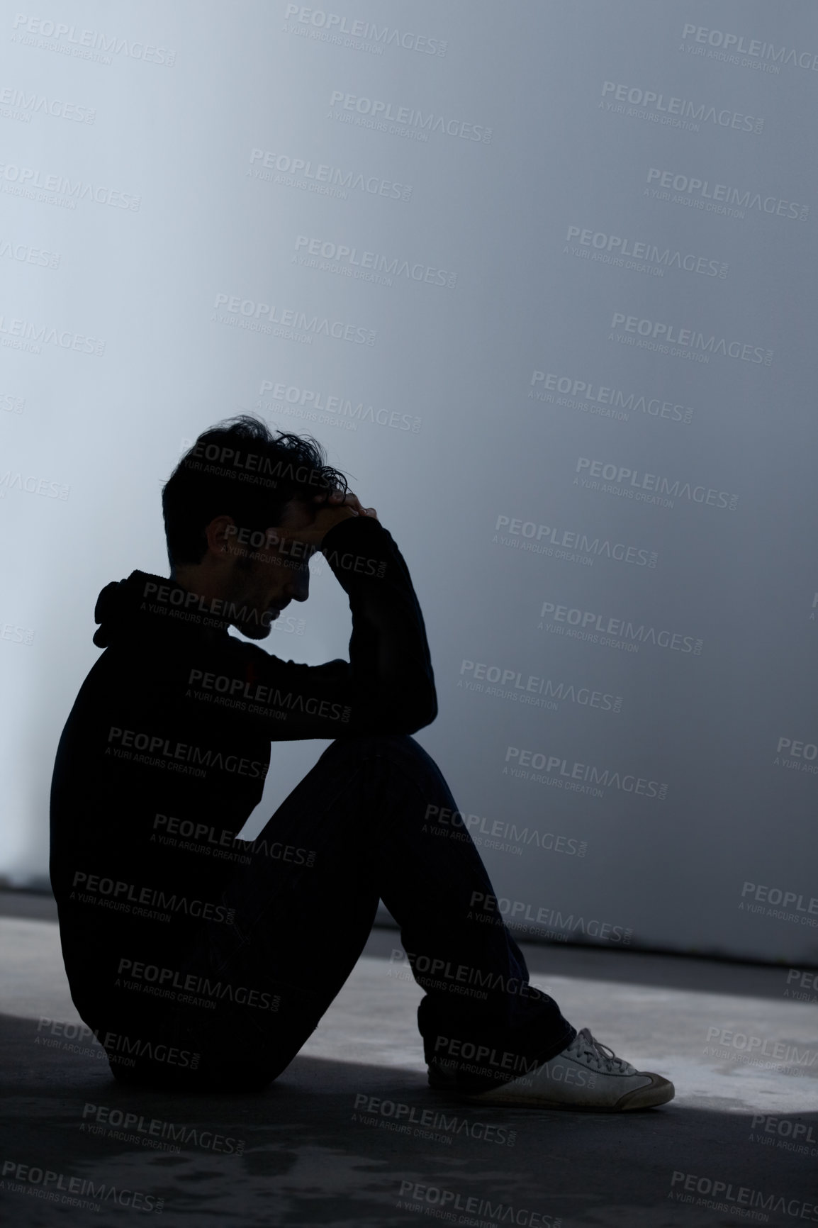 Buy stock photo Man, sad or depression with mental health and silhouette, stress or burnout with financial or life crisis. Emotional, thinking about pain and trauma, bankruptcy or debt with anxiety and psychology