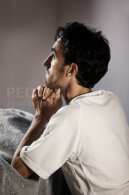 Buy stock photo Man, praying and home for faith, religion and hope in bedroom asking for help with mental health, depression or loss. Sad Christian person in prayer thinking of job, spiritual guidance or worship God