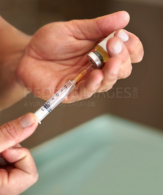 Buy stock photo Filling a syringe, hands and clear liquid injection of testosterone and bottle, steroids and closeup of bodybuilder. Male athlete, grow strong muscles on hormone supplement and vial with needle 