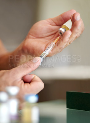 Buy stock photo Medicine, filling a syringe and hands with clear liquid injection of testosterone or bottle, steroids and closeup of hands. Athlete, fitness performance on supplement and medicine vial with needle 