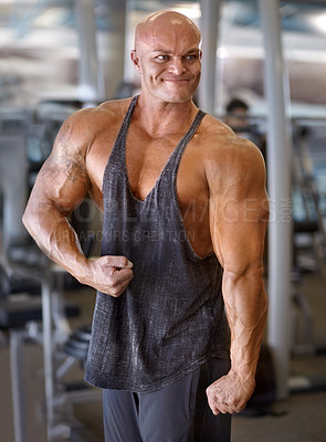 Buy stock photo Body builder, exercise and man flex in a gym with power, weightlifting machine and strength. Muscle, strain and strong male athlete with training for bodybuilder fitness and wellness for sport
