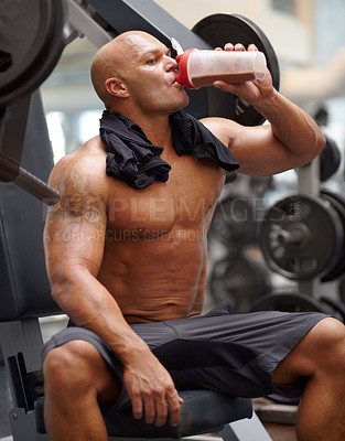 Buy stock photo Man in gym, bodybuilder and drinking shake for fitness, training exercise and strong body with protein. Workout, health and bodybuilding, wellness with healthy beverage for hydration and power