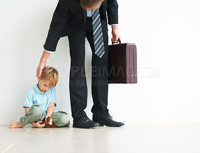 Buy stock photo Businessman, work and home by child for sad, autism and touch head for care or stop fear, support and anxiety. Father, kid and mental health on floor to help son, tired man and professional in stress
