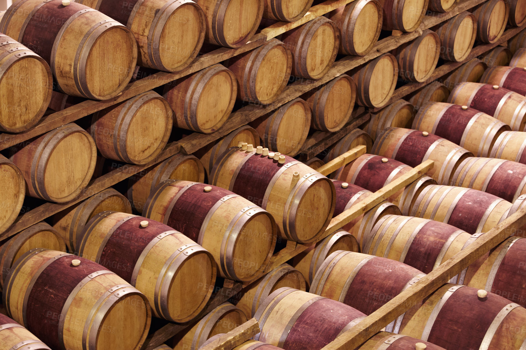Buy stock photo Storage, winery cellar and wood barrel collection or red wine, alcohol and luxury, vineyard industry container and process. No people, warehouse and expensive vintage, drink vault or grape business
