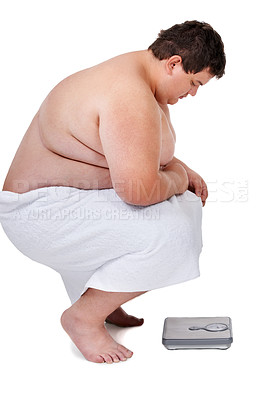 Buy stock photo Scale, plus size and man checking number and weight loss progress in a studio. White background, male person and profile of a heavy set model looking at health and wellness results with a towel