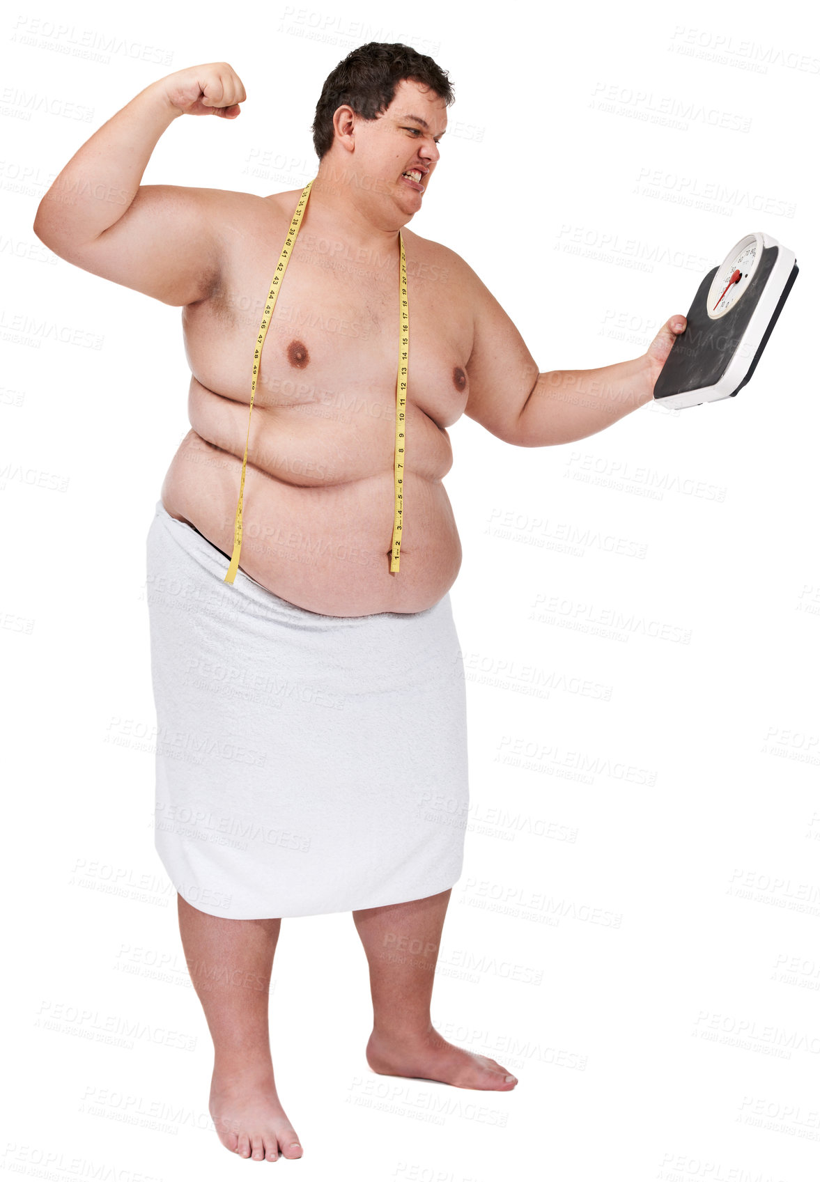 Buy stock photo An overweight young man looking angry and about to punch a weight scale