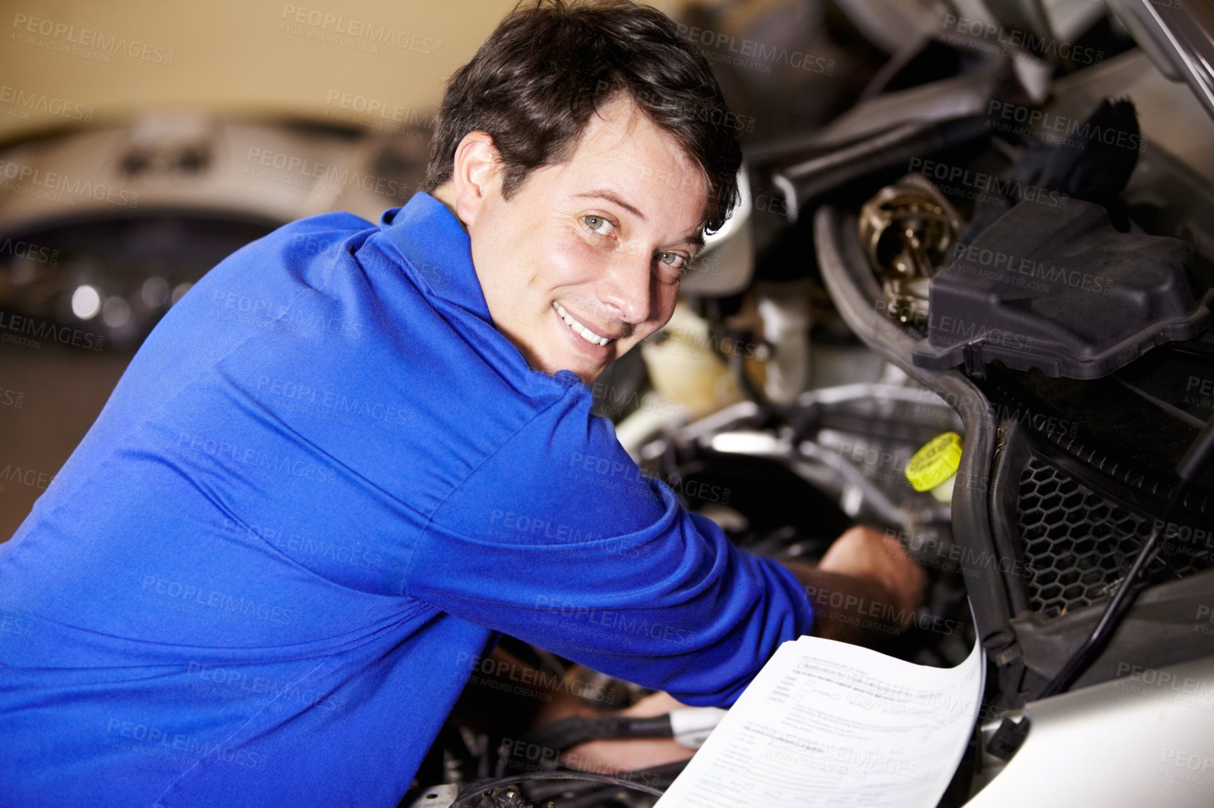 Buy stock photo Portrait, happy man and mechanic with document on engine of car, repair or maintenance. Smile, face and technician with paperwork on motor vehicle, auto service or workshop, garage or small business
