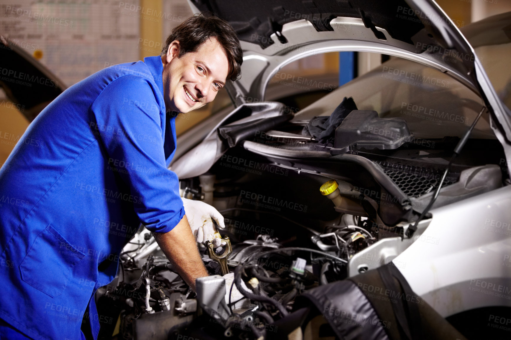 Buy stock photo Portrait, happy man and mechanic check oil on engine of car, repair and maintenance. Face, smile and technician on motor vehicle, fixing transport or inspection at auto service workshop or business