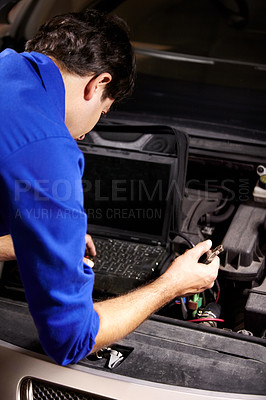 Buy stock photo Car, diagnostic or repair and a mechanic man in a workshop as an engineer looking at the engine of a vehicle. Garage, report or service with a young technician working under the hood of an automobile