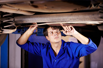 Buy stock photo Car, inspection or service with an engineer man in a garage for a report on a vehicle repair for insurance. Maintenance, professional and expertise with a young mechanic in a workshop for assessment