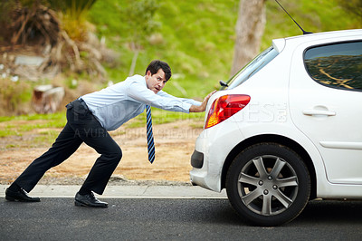 Buy stock photo Businessman, push car or breakdown on road engine fail,  emergency tyre or auto service. Male person, work transport and face or stress for petrol crisis travel risk, strength or oil accident repair
