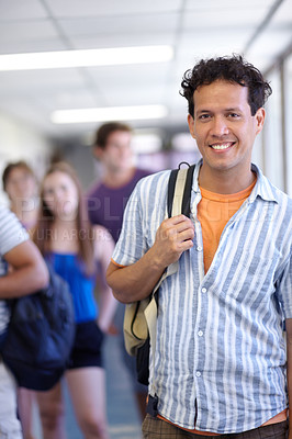 Buy stock photo Student, university and backpack in corridor, smile and ready for class, man and happy. Portrait, education and knowledge for learning, study and college for career, campus and youth scholarship
