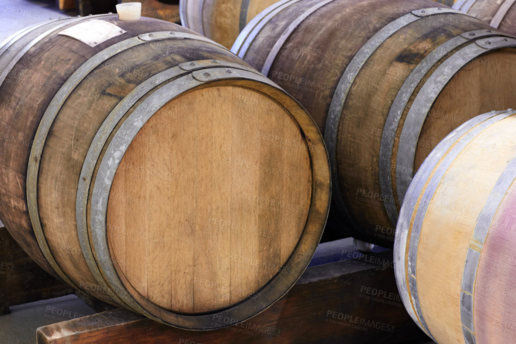 Buy stock photo Barrels of wine in a wine distillery