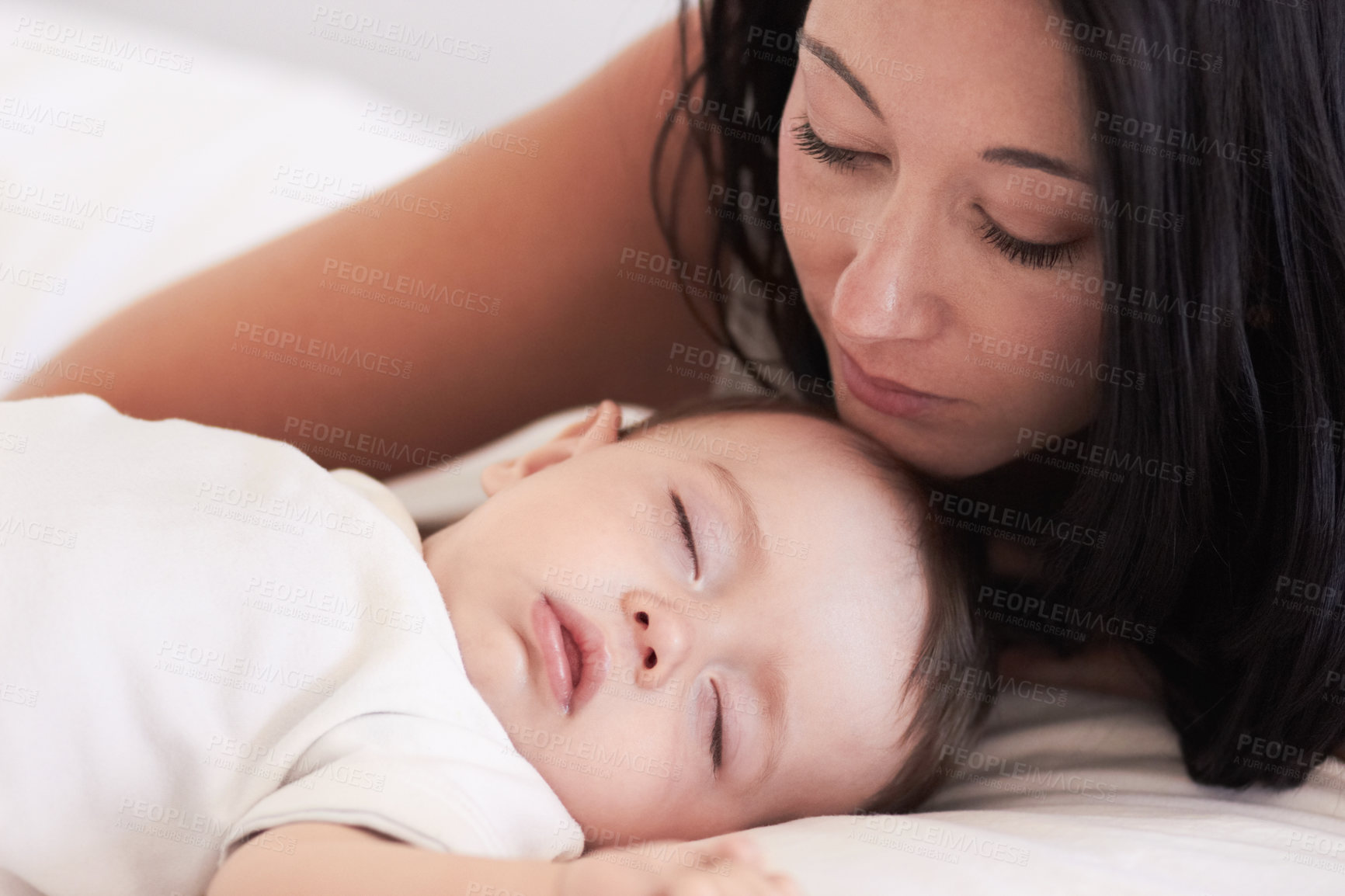 Buy stock photo Baby, sleeping and mother in a home bedroom with parent support, care and love. Relax, bed and young girl with mom in a house feeling tired and sleepy with mama rest looking at fatigue of kid