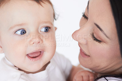 Buy stock photo Love, family and face of baby with mother for care, bonding and enjoy quality time together. Child development, youth growth and infant toddler with mom, mama or woman with single parents childcare