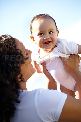 Buy stock photo Family, mother and baby outdoor in summer on a blue sky background with a mother lifting her infant daughter for flying. Love, kids and a mom holding her female child while bonding together in summer