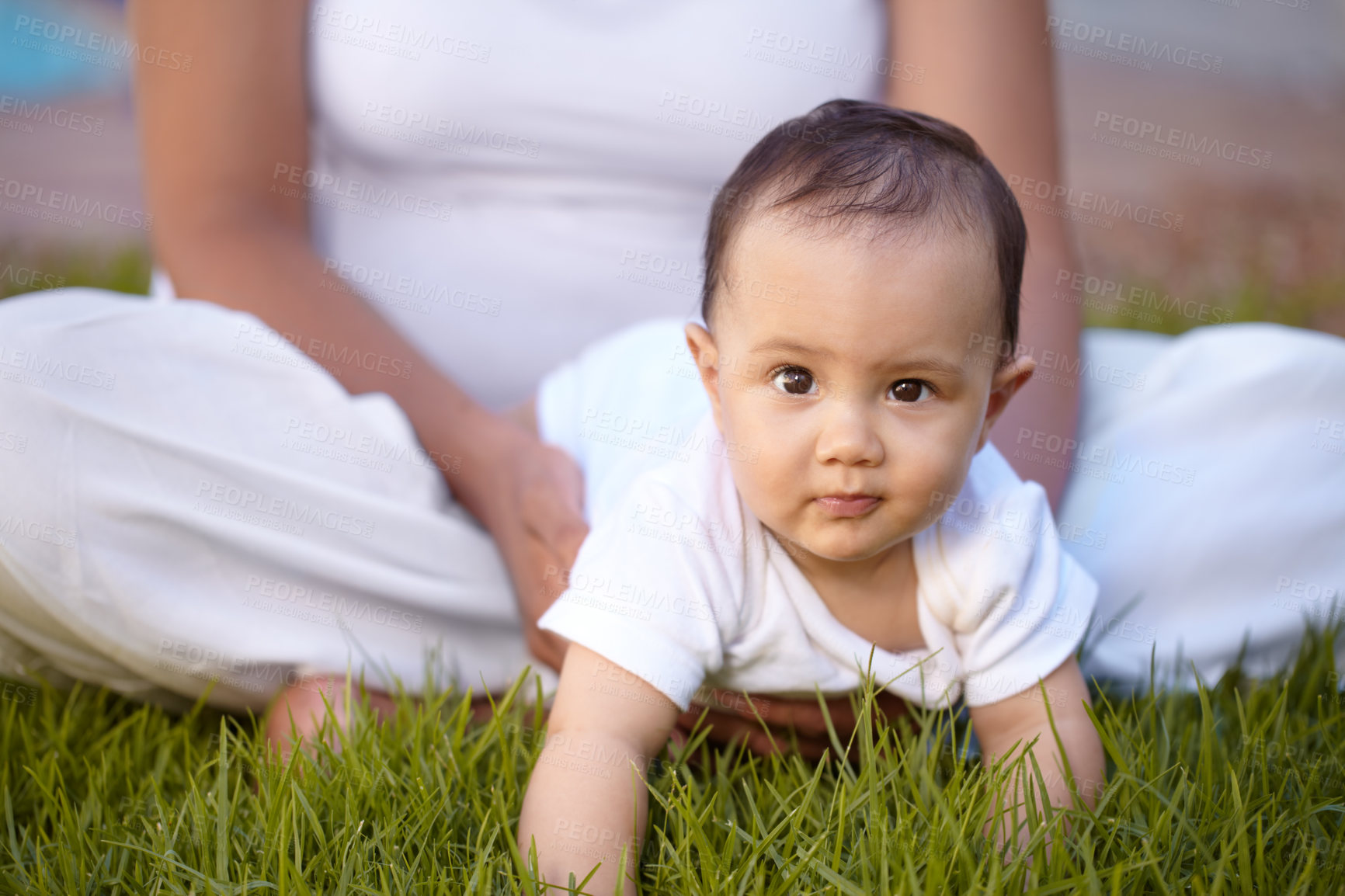 Buy stock photo Portrait, crawling and baby with a mother in the park together during summer for bonding, care and playing. Kids, face and a curious infant child with mama on grass, garden and in nature outdoor