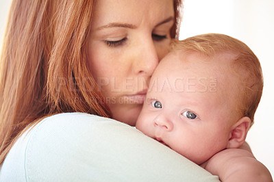Buy stock photo Kiss, baby and portrait with mother holding newborn in home for bonding together. Infant, face and mom carrying infant child in arms to relax in house with love, care and support with mommy 