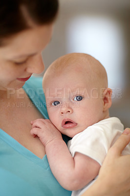 Buy stock photo Calm, baby and portrait with mother holding newborn in home for bonding together. Infant, face and mom carrying curious child in arms to relax in house with love, care and support with mommy 